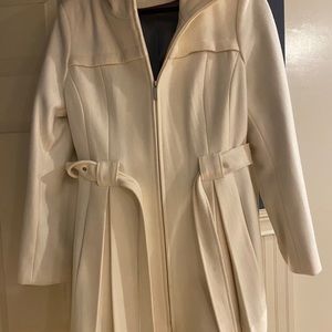 Cream colored pleated coat
